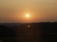 Zonsondergang van op het terras